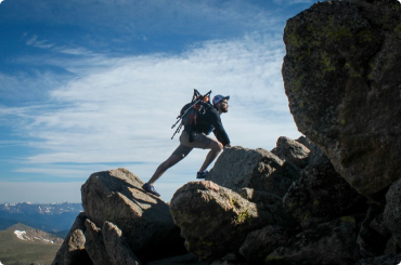 Hikers resting on rocks