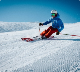 Person skiing on a snowy mountain